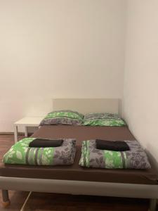 Postel nebo postele na pokoji v ubytování U6 Schöpfwerk Hostel 11
