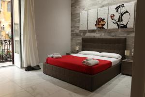 A bed or beds in a room at A Durmì Suite