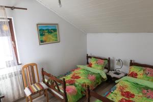 Postel nebo postele na pokoji v ubytování Guest House Fena