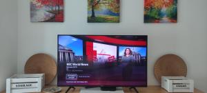 TV/Unterhaltungsangebot in der Unterkunft Tranquilo apartamento con vistas al mar.