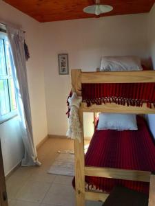 Poschodová posteľ alebo postele v izbe v ubytovaní Dylan de MyAalquileres