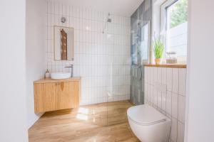 Koupelna v ubytování Ahoi Jantar Domki Premium + 9 fotografií