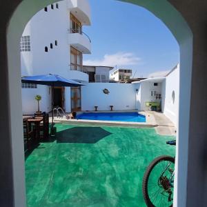 a view of the swimming pool of a villa at El Capricho II Paracas in Paracas