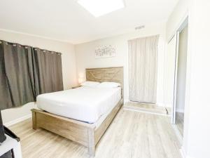 Llit o llits en una habitació de Beautiful room in prime location