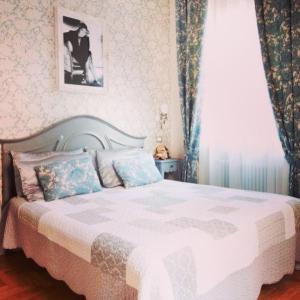 Un pat sau paturi într-o cameră la Bed and Breakfast 30