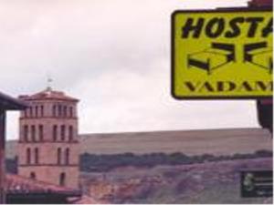 a sign that says lost vatican in front of a building at Hostal Vadama in Segovia
