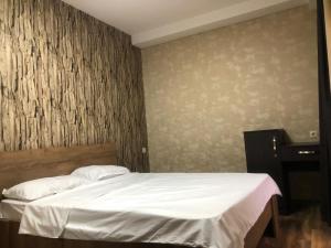 Ένα ή περισσότερα κρεβάτια σε δωμάτιο στο Tbilisi Loves You