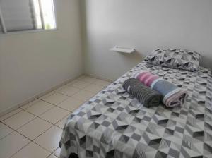 Postel nebo postele na pokoji v ubytování Apartamento inteiro no Bairro Alto Umuarama