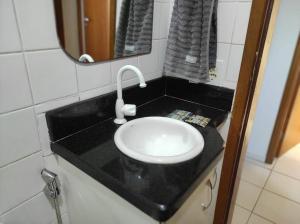 Koupelna v ubytování Apartamento inteiro no Bairro Alto Umuarama