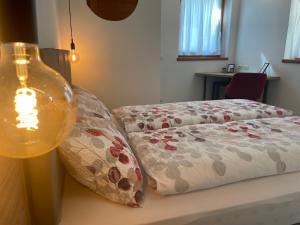 Postel nebo postele na pokoji v ubytování B&B NALÙ