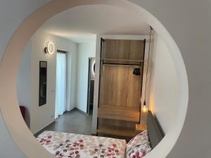 Postel nebo postele na pokoji v ubytování B&B NALÙ