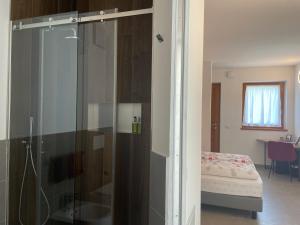Postel nebo postele na pokoji v ubytování B&B NALÙ