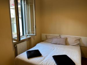 Säng eller sängar i ett rum på LS Rooms - Appartamento in Centro Vista Mare