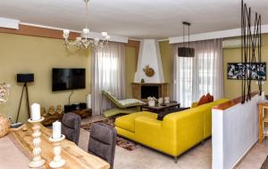 TV a/nebo společenská místnost v ubytování Kalendes home