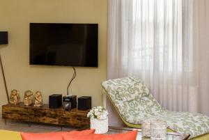 TV a/nebo společenská místnost v ubytování Kalendes home