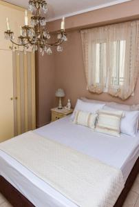 Postel nebo postele na pokoji v ubytování Kalendes home