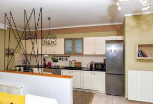 Kuchyň nebo kuchyňský kout v ubytování Kalendes home