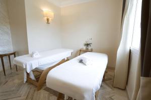 Postel nebo postele na pokoji v ubytování Hotel Fiuggi Terme Resort & Spa