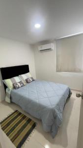 Katil atau katil-katil dalam bilik di Caribe campestre coveñas