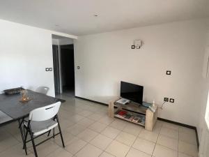 TV/trung tâm giải trí tại Villa Quenette au François