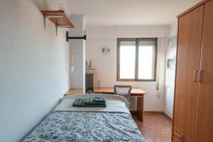 Posteľ alebo postele v izbe v ubytovaní An apartment in Xeraco with 3 bedrooms, located near beach and Gandia