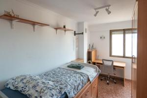 Posteľ alebo postele v izbe v ubytovaní An apartment in Xeraco with 3 bedrooms, located near beach and Gandia