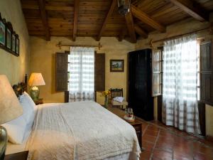 Ein Bett oder Betten in einem Zimmer der Unterkunft Hotel Casona de Manzano
