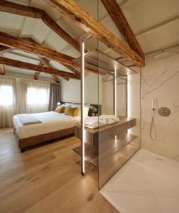 Poschodová posteľ alebo postele v izbe v ubytovaní Palazzina RIVA