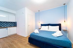 Llit o llits en una habitació de Procida - Roots Partenopee