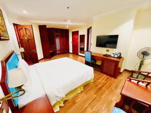 TV a/nebo společenská místnost v ubytování CALYSSA HOTELS & VILLAGE