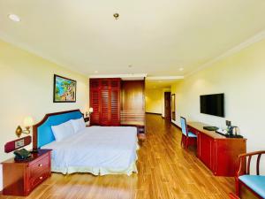 TV a/nebo společenská místnost v ubytování CALYSSA HOTELS & VILLAGE