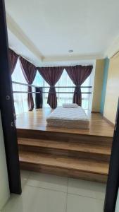 Кровать или кровати в номере Sky Residence -3 Bedrooms Condo at Cinta Sayang, Sungai Petani +16 фотографий