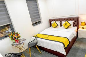 Postel nebo postele na pokoji v ubytování ROSA QUEEN HOTEL