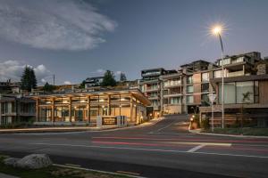 an empty street in front of a building at Marina Terrace, Wanaka in Wanaka