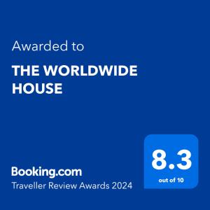 札幌THE WORLDWIDE HOUSE的标有世界范围房屋的单词的蓝色文本框