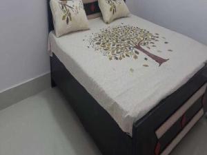 Cama ou camas em um quarto em OYO Hotel Rohit Sagar