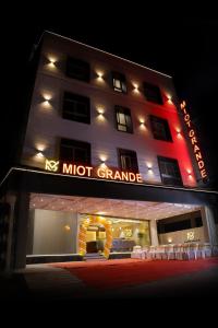 a building with a muppet grande sign on it at Miot Grande in Chennai
