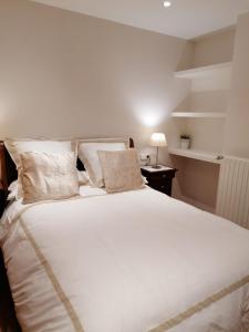 A bed or beds in a room at Apartamento Costa con Parking Privado Incluido