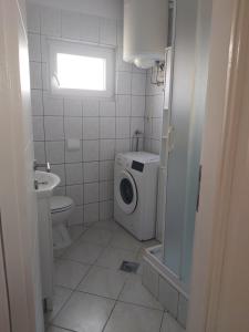 Koupelna v ubytování Apartment Lara + 21 fotografií