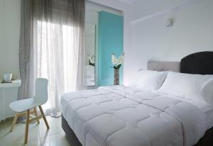 Postel nebo postele na pokoji v ubytování Coral Hotel