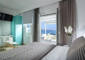 Postel nebo postele na pokoji v ubytování Coral Hotel