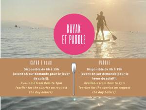a flyer with a man paddle boarding on the water at La Jabotte in Antibes