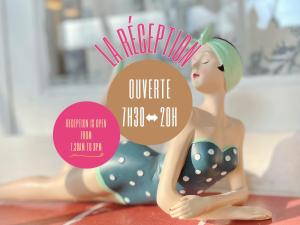a plastic figurine of a woman in a bathing suit at La Jabotte in Antibes