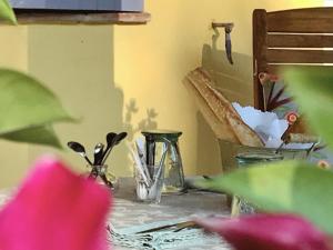 a table with scissors and other items on it at La Jabotte in Antibes