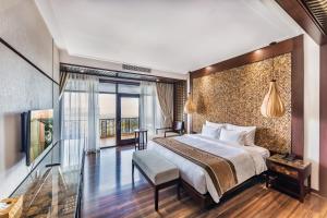 Postel nebo postele na pokoji v ubytování Vietsovpetro Ho Tram Beach Resort & Spa