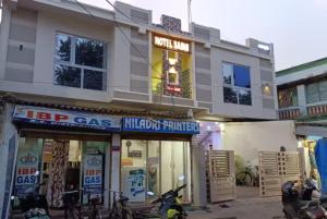 a store with bikes parked in front of it at Goroomgo Sashi Near Golden Beach Puri - Excellent Service in Puri