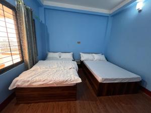 Postel nebo postele na pokoji v ubytování Hotel Atithi Devo Bhava