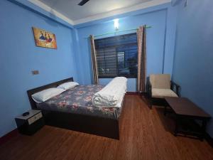 Postel nebo postele na pokoji v ubytování Hotel Atithi Devo Bhava