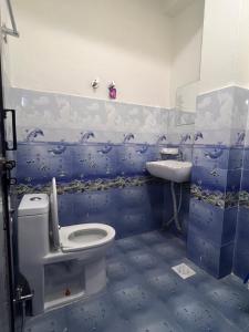 Koupelna v ubytování Hotel Atithi Devo Bhava + 25 fotografií