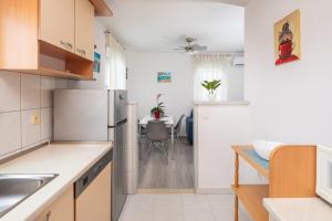 Kuchyň nebo kuchyňský kout v ubytování West Side Apartment